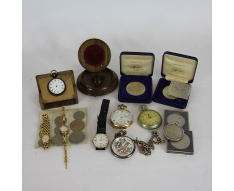 A gold plated Limit open face pocket watch, a military issue stop watch, a turned wooden pocket watch stand, a Woodford skele