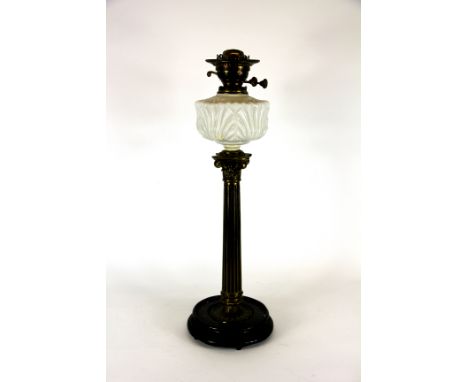 A Victorian fluted corinthian column oil lamp, with moulded opaque glass reservoir, 64cm high 
