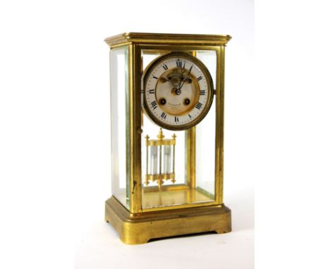 A 19th century French brass four glass mantel clock, white enamel chapter ring with black Roman numerals, dial signed 'Klafte