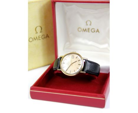 A Gentleman's Omega Automatic De Ville wrist watch, the yellow metal, circular case with silvered dial, gold batons and centr