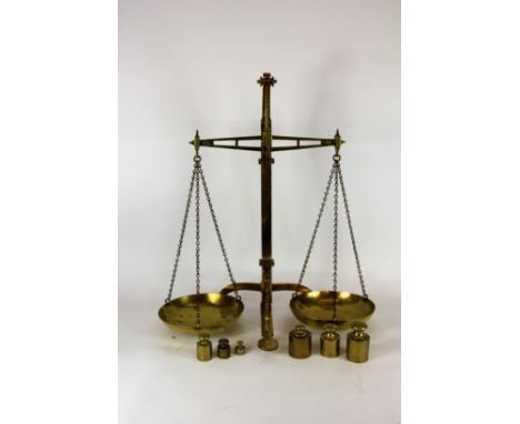 A set of brass scales by J. Hare of Birmingham, class 1, with six assorted weights, 62cm