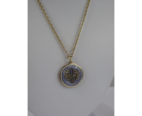 A Fine Lady's Edwardian 14 ct Yellow Gold Guilloche Enamel and Diamond Mourning Pendant, the lilac enamel pendant set having 