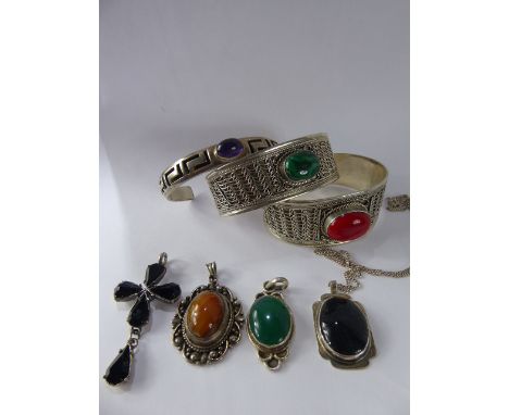 Three Lady's Vintage Silver Middle Eastern Bangles, one set with red stone the other tiger's eye, third with amethyst togethe