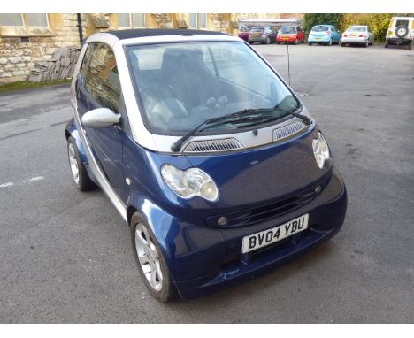 A 2004 Registered 4/2 Smart Car, the City Passion 61 Automatic Convertible having covered only 54 900 miles with Jan speed ex