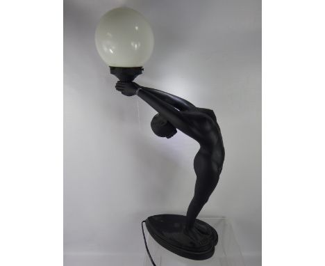 An Art Deco Figure Lamp Base, depicting a feminine nude supporting a globe shade, approx 71 cms