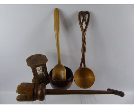 Miscellaneous Treen, including wine bottle coaster, spill vase, teak ships timber timer, washing dolly, bread board and ladle