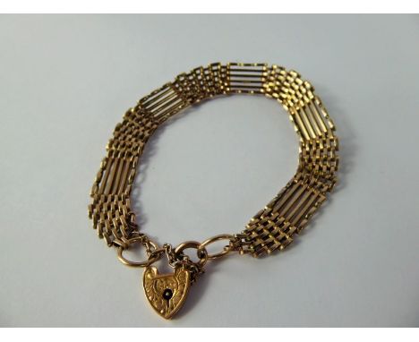 A Lady's 9 ct Gold Gate Link Bracelet, with heart form clasp, approx 13.4 gms