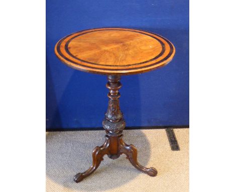 A Victorian Mahogany Inlaid Wine Table, having carved tripod base, approx 69 cms dia.