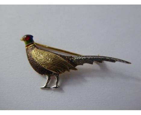 A 9ct Tri-Gold and Enamel Brooch, depicting a pheasant.