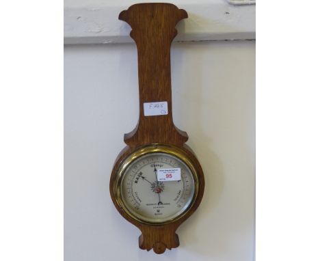 A Vintage Oak Cased Barometer, by Negretti and Zambra - London.