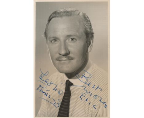 Leslie Phillips signed vintage black and white postcard photo. Good condition. All autographs come with a Certificate of Auth