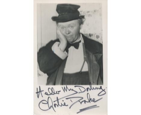 Charlie Drake signed vintage black and white 6x4 postcard photo. Good condition. All autographs come with a Certificate of Au