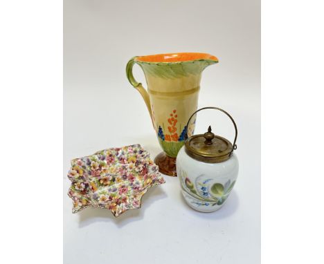 A Myott and Son &amp; Co hand painted 1930s tapered jug with C scroll handle to side, with stylised floral design, (22cm x 13