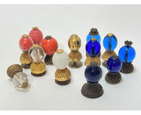 A collection of thirteen various blue glass, white glass, gilt, pink, ceramic and clear glass mandarin style hat knob handles
