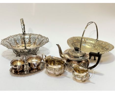 An Epns three piece chased tea serving including teapot, sugar basin and milk jug, an Epns swing handled cake basket with a l