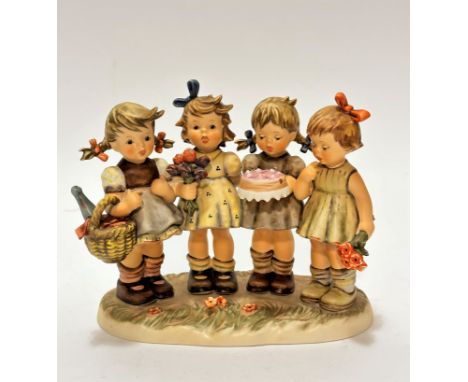 A large Hummel pottery group, We Wish you Best, decorated with polychrome enamels, (22cm x 24cm x 8cm), complete with origina