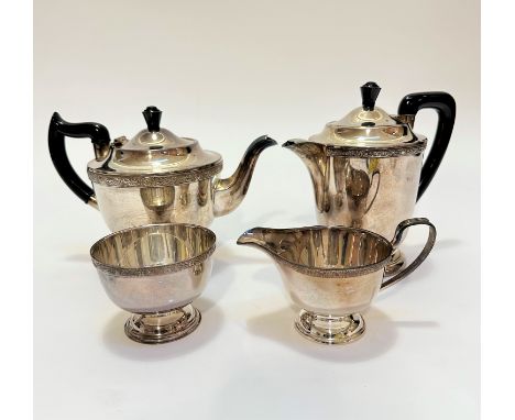A four piece Epns tea and coffee service with Celtic style knot border and black bakelite knots and handles, (teapot 19cm x 2