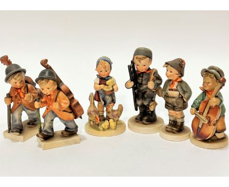 A collection of six Hummel pottery figures The Young One playing with double bass, The Chimney Sweep, a girl with chickens an