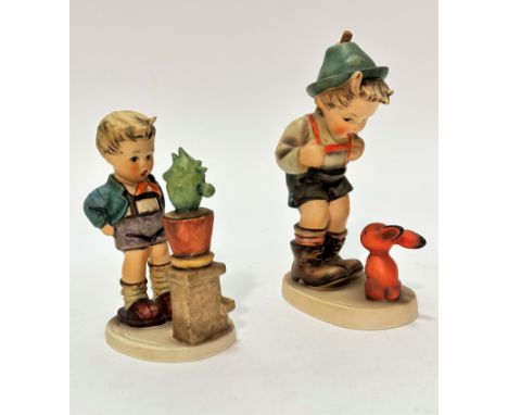 A Hummel figure Confidentially of boy with pottery cactus style head and The Sensitive Hunter, of large unusual size, (19cm x
