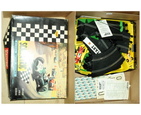 Scalextric a boxed pair to include I Pair PT/82 Change Overs 13.75" Long &amp; GP33 Set. All are unchecked for completeness. 