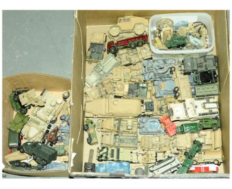 A unboxed military related group to include manufacturers such as Corgi, Lledo, Dinky, Kit Built and similar. See photo for m