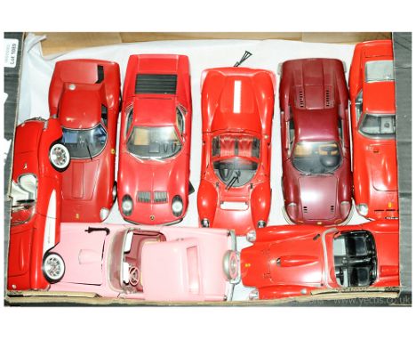 A unboxed 1/18 scale group to include Anson Ferrari Dino 246GT, Jouef evolution Ferrari 330 P4, Bburago Ferrari 250 Testa Ros