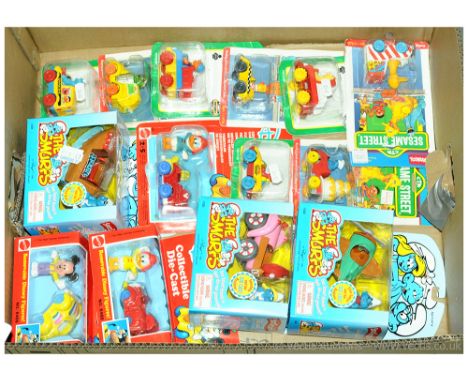 A boxed TV &amp; Film group to include Playskool &amp; Matchbox Sesame Street Blister Card models, Irwin The Smurfs models &a