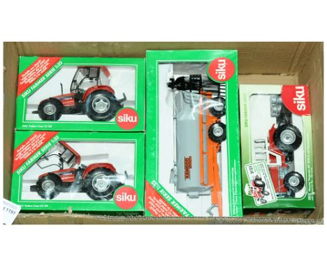 Siku a boxed Farm related group to include 2x 2963 Tractor Case CS 150, 2853 Massey Ferguson MF3050A with Transporter Box &am