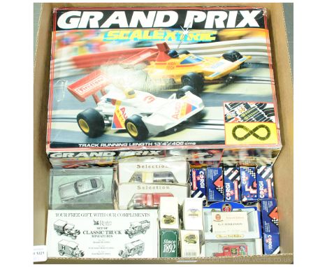 A mixed boxed group to include Scalextric Grand Prix Set, GE Fabrri James Bond Aston Martin DB5, boxed Corgi, Lledo &amp; Oxf