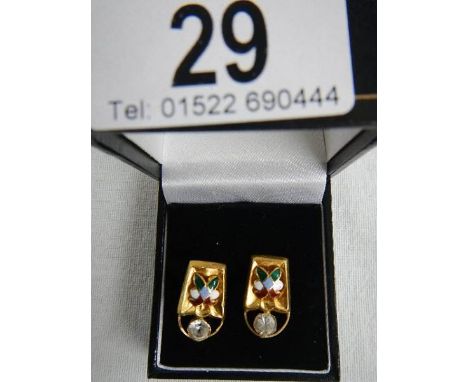 A pair of diamond and enamel earrings, test as 22 ct gold, in good condition. ****Condition report**** Weight approx. 4.3gms.