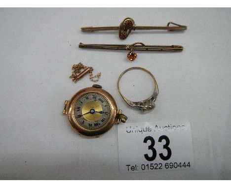 A 9ct gold ring size R Half, A gold ladies watch head, a small chain a/f and two brooches. ****Condition report**** Watch app