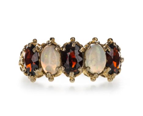 RED GEM SET AND OPAL FIVE STONE RING, formed by alternating red gems and opals, with spherical terminals to each section, in 