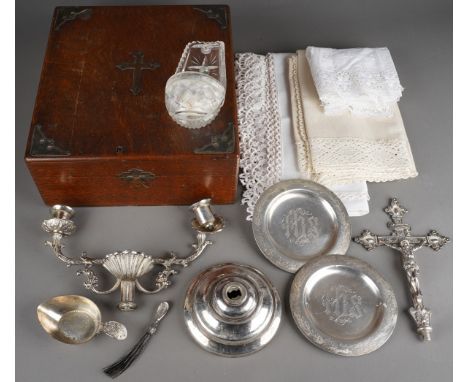 An oak cased "Sick-Call Outfit" in "Special Metal" plate, comprising a two light crucifix, two patens, stoup and brush water 