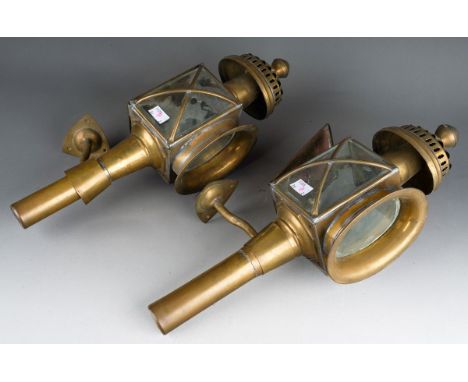 A pair of 20th century brass carriage style lamps,  fitted with bracket mount, height 47cm (2)