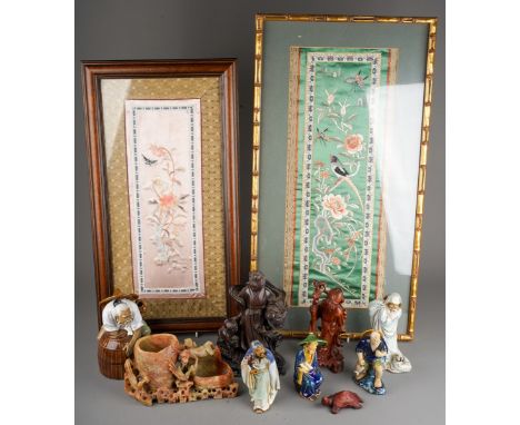 Two framed and glazed Chinese embroidered silk panels, together with a box of treen, stone and ceramic oriental figures , etc