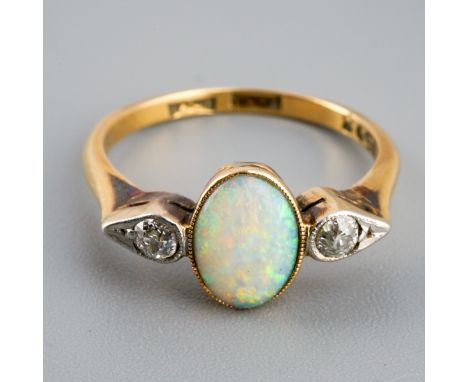 9 ct gold ring set with opal and 2 chip diamonds in platinum, UK size M, gross weight 3.1g