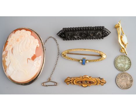 A 9ct gold brooch, stamped 9ct together with a yellow metal oval brooch and a gold plated 925 silver brooch with opal to cent