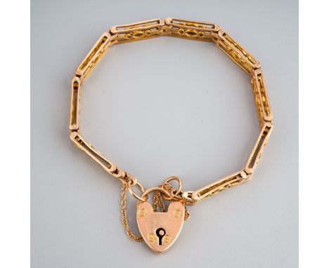 A gate bracelet with heart shaped padlock and safety chain, padlock clasp stamped 9ct, approx length 190mms, approx gross wei