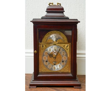 A 20th century German Kieninger 8-day musical bracket clock in the 18th century style, mahogany case, with  arched brass dial