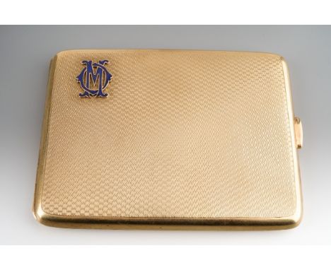 A George V 9ct gold engine turned cigarette case, applied with enamelled MO monogram to upper left section, engraved inscript
