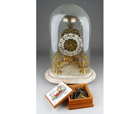 A 19th Century Victoria brass skeleton clock and box of keys