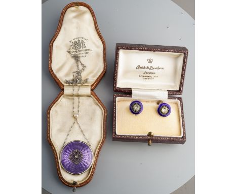 An Edwardian purple enamel, diamond and pearl necklace. The circular purple guilloche enamel photograph pendant with central 
