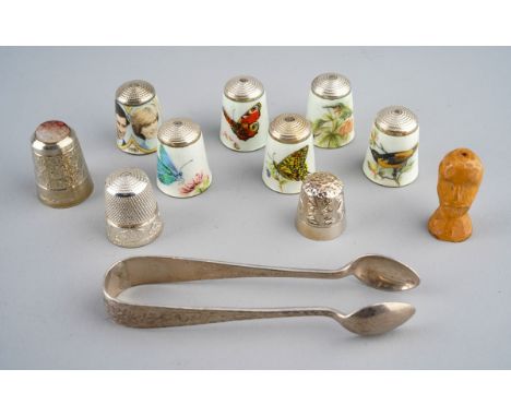 Two Modern Traditional style silver thimbles, hallmarked Birmingham together with a collection of six white metal and enamel 
