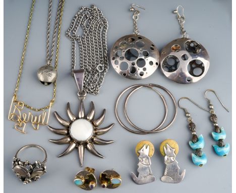 A small group of silver and costume jewellery, including a hallmarked silver Silvarious sunburst pendant on a plated chain, a