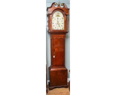 A late Georgian oak and elm cased long cased clock, broken swan neck pediment, doric columns flanking the dial door, painted 