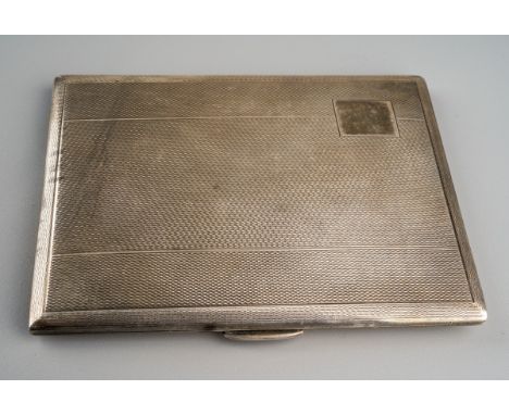 A George VI silver engine turned cigarette case, hallmarked Birmingham, 1936, weight approx 159.1 grams (5.11 ozt)