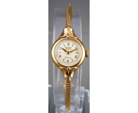 A ladies vintage 9ct gold Rotary wristwatch on a 9ct flexible strap with safety catch, London, gross weight with movement rem