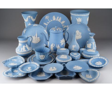 A collection of blue Wedgwood Jasperware to include coffee pot, cup and saucer, trinket dishes and lidded trinket dishes, vas