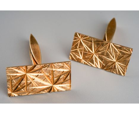 A pair of Elizabeth II 9ct gold cufflinks, the rectangular fronts with abstract engraved design, Birmingham hallmarks, 8.3 gr