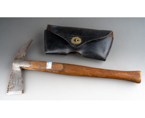 An early 20th Century Fire Axe, stamped John Morris & Sons Fire Engineers Manchester, wooden handle, with original case over 